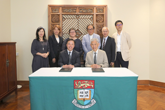 Mr Tin Hing Sin, Chairman of the Tin Ka Ping Foundation (front right), signs the donation agreement with HKU President and Vice-Chancellor Professor Xiang Zhang (front left).
Back row from left to right: Ms Bernadette Tsui Wing-Suen, HKU’s Associate Vice-President (Development & Alumni Affairs); Ms Peggy Cheung, Director of the Tin Ka Ping Foundation; Professor Lin Goodwin, HKU’s Dean of Education; Mr Tai Hey-Lap, Vice Chairman of the Tin Ka Ping Foundation; Mr Tin Wing Sin, Director of the Tin Ka Ping Foundation; and Mr David Day, Chief Executive of the Tin Ka Ping Foundation.