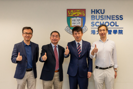 Professor Hongbin Cai (second right), the Dean of HKU Business School, shared the joy with some research team members, including Professor Zhiwu Chen, Project Coordinator, Chair Professor and Cheng Yu-Tung Professor of Finance (second left), Professor Chen Lin (first right), Associate Dean (Research and Knowledge Exchange) and Dr. Chicheng Ma (first left), Assistant Professor in Economics.